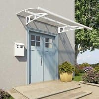 White Palram Canopia Bordeaux canopy with curved design, mounted over double doors on a light gray wall.