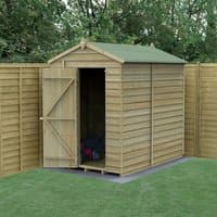 Wooden apex shed, 7'x5', overlap pressure treated, windowless, green roof, open door, set in garden with fence backdrop.