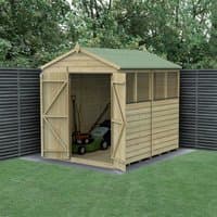 Wooden apex shed with double doors, four windows, shiplap cladding, green roof, and pressure-treated timber.
