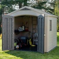 Keter Factor plastic garden shed, beige with gray double doors, window, and gable roof, 8' x 8'.