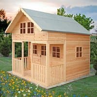 Wooden playhouse with pitched roof, front porch, and multiple windows, set in a garden with flowers.