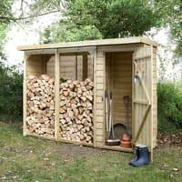 Wooden log store with slanted roof, open log section, and enclosed tool storage with door, set in a garden.