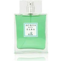 Clear glass bottle with green liquid, labeled "Acqua dell'Elba - Arcipelago," silver spray cap, unisex woody perfume.