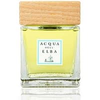 Square glass bottle with yellow liquid, wooden cap, and Acqua dell'Elba label for citrus diffuser.