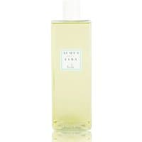 Clear rectangular bottle with white cap, labeled "Acqua dell'Elba," containing yellow liquid, 500 ml spicy diffuser refill.