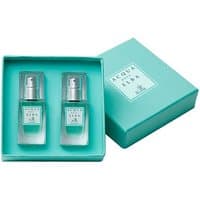 Turquoise box with two clear glass bottles of Acqua dell'Elba Mia Classica Uomo, featuring silver spray tops.