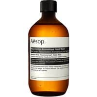Amber bottle of Aesop Resurrection Aromatique Hand Wash, 500 ml, with white label and black screw cap.