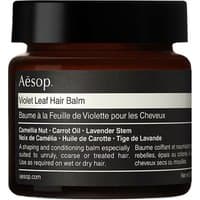 Aesop Violet Leaf Hair Balm in a dark amber jar with black lid and white label, 60 ml size.