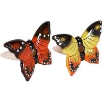 Set of two butterfly waterers, one red and black, one yellow and black, with white spots and detailed wing patterns.