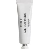 White Byredo Bal d'Afrique hand cream tube, black text, silver cap, 30 ml size.