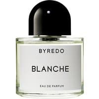 Clear glass bottle of Byredo Blanche Eau de Parfum, black cap, white label with bold black text, 50 ml women's floral perfume.