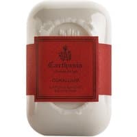 Carthusia Corallium soap, 125g, white bar with red label featuring brand logo and product details.