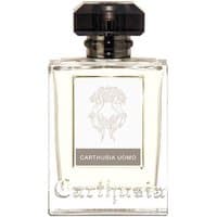 Clear glass bottle with black cap, Carthusia Uomo label, containing 50 ml of men's woody Eau de Parfum.