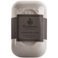 Carthusia Uomo soap bar, 125g, in white with a dark gray label featuring an elegant logo and text.