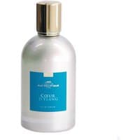 Silver bottle of Comptoir Sud Pacifique Coeur d'Ylang Eau de Parfum, blue label, gold cap, 100 ml.