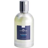 Clear glass bottle with silver cap, blue label reading "Vetyver Haiti," 100 ml unisex woody perfume by Comptoir Sud Pacifique.