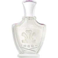 Clear glass bottle of Creed Acqua Fiorentina Eau de Parfum, floral design, silver cap, embossed logo.