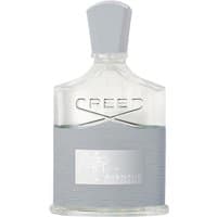 Clear glass bottle of Creed Aventus Cologne, 100 ml, with a silver cap and textured gray label, unisex citrus perfume.