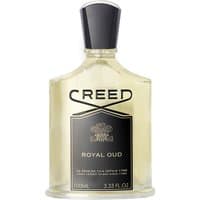 Clear glass bottle of Creed Royal Oud Eau de Parfum, black label with gold accents, 100 ml size, unisex fragrance.