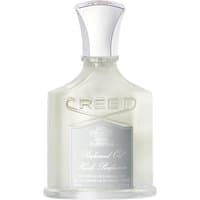 Clear glass bottle of Creed Silver Mountain Water body oil, silver cap, embossed logo, and metallic label.