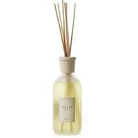 Amber Oriental diffuser with clear glass bottle, wooden cap, and reed sticks, labeled "Culti - Fuoco Stile Diffusore 500 ml".