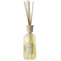Culti Tessuto Stile Diffusore 500 ml, clear glass bottle with beige cap and reed sticks, musk fragrance.