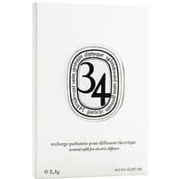 Diptyque 34 car diffuser refill in white box with black oval logo and text detailing.