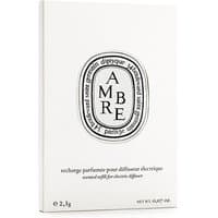 White Diptyque Ambre car diffuser refill box with black oval logo and text detailing fragrance notes.