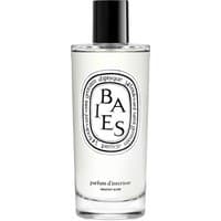 Clear glass bottle of Diptyque Baies fruity room spray with black cap and oval label.