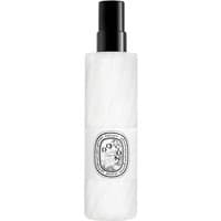 White cylindrical Diptyque Do Son Body Mist bottle, black cap, ornate label, 200 ml size.