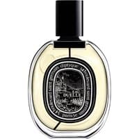 Clear glass bottle with black cap, oval label, and intricate design, containing Diptyque Eau Duelle Eau de Parfum 75 ml.