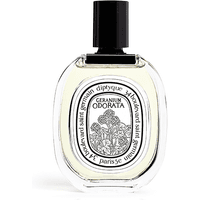 Clear glass bottle with black cap, oval label featuring floral design, Diptyque Geranium Odorata Eau de Toilette 100 ml.