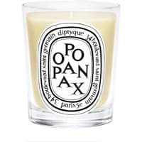 Diptyque Opopanax candle in clear glass jar with black and white label, featuring bold black lettering.
