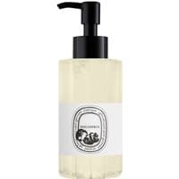 Clear bottle of Diptyque Philosykos Hand & Body Gel, black pump, white label with black logo.