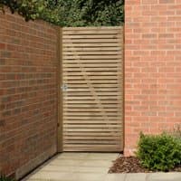 Wooden double slatted gate with vertical and diagonal slats, set between brick walls, measuring 3' x 6'.