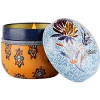 Fragonard citrus candle in orange floral tin with blue lid featuring intricate botanical design.