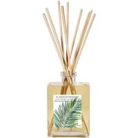 Square glass bottle with lemongrass diffuser sticks, green leaf label, filled with citrus-scented liquid.