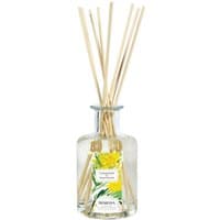 Fragonard Mimosa Diffuser with clear glass bottle, yellow floral label, and natural reed sticks.