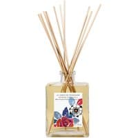 Amber glass diffuser with wooden reeds, square bottle, floral label, Fragonard Myrrhe Patchouli scent.