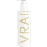 White Fragonard shampoo bottle with pump dispenser, featuring "VRAI" in large beige letters.