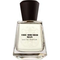 Clear glass bottle with black cap, labeled "The Orchid Man Eau de Parfum" by Frapin, 100 ml men's fruity perfume.