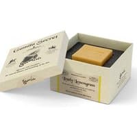 Gamila Secret Lively Lemongrass Cleansing Bar in an open beige box with black lining, showcasing a yellow soap bar.