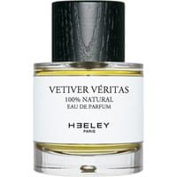 Clear glass bottle with black cap, Heeley Vetiver Veritas Eau de Parfum label, 50 ml, unisex floral fragrance.