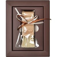 Hobe Pergh face brush gift pack with wooden handle and soft bristles in a brown box with ribbon.