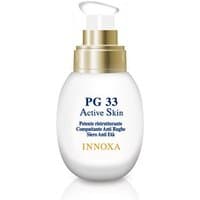 White Innoxa Active Skin serum bottle with gold pump and blue text, 30 ml size for mature skin toning.