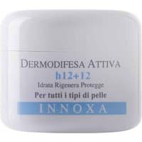 White Innoxa face cream jar with blue accents, labeled "Dermodifesa Attiva h12+12" for all skin types, 50 ml.