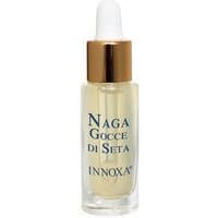 Clear glass dropper bottle with gold cap, labeled "Naga Gocce di Seta Innoxa," containing anti-aging face fluid.