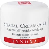 White Innoxa Special Cream A jar with red label, 50 ml, for oily skin, text in black and Italian, round container.