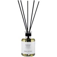 Laboratorio Olfattivo citrus diffuser, clear glass bottle with black reeds and white label, 200 ml capacity.