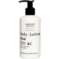 White bottle of Laboratorio Olfattivo Nun Body Lotion 250 ml with black pump and minimalist text design.